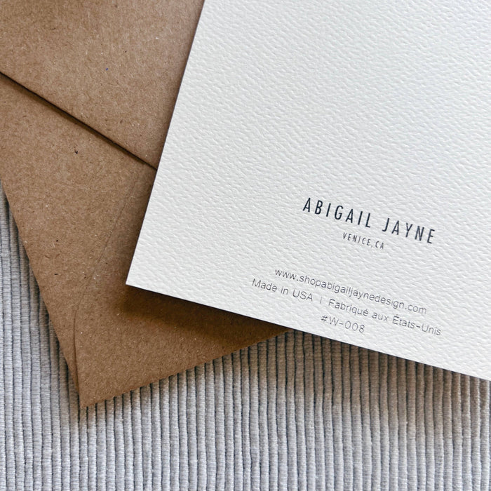 Abigail Jayne Design sympathy card with kraft envelope on textured neutral background