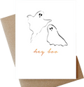 A white greeting card with minimalist black ghost illustrations and the words 'hey boo' in orange script, shown with a brown kraft envelope on a white background.