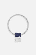 APM Beaded Bracelet with interchangeable charms, a playful twist of midnight blue and shimmer.