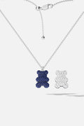 APM Bear Necklace, playful charm in deep blue and sparkling white.