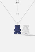 APM Yummy Bear Necklace, a playful duo in midnight blue and sparkling white.