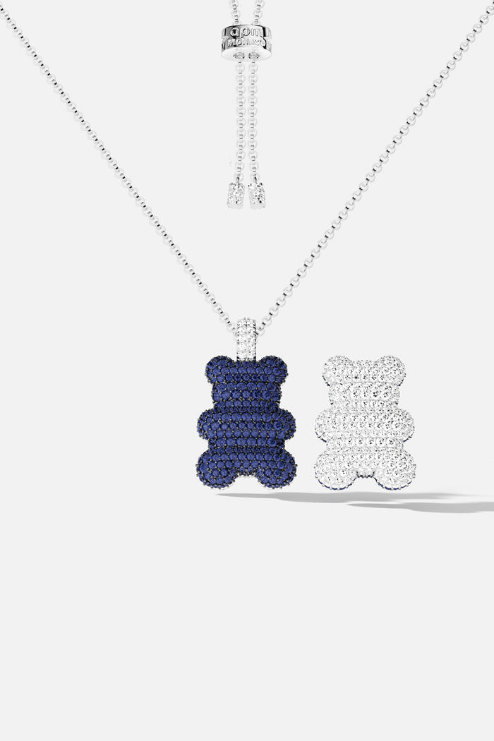 APM Yummy Bear Necklace, a playful duo in midnight blue and sparkling white.