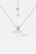 APM Necklace, a playful pin charm in tri-color brilliance, effortlessly chic.