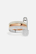 APM Ring, a playful pin charm meets shimmering two-tone allure.