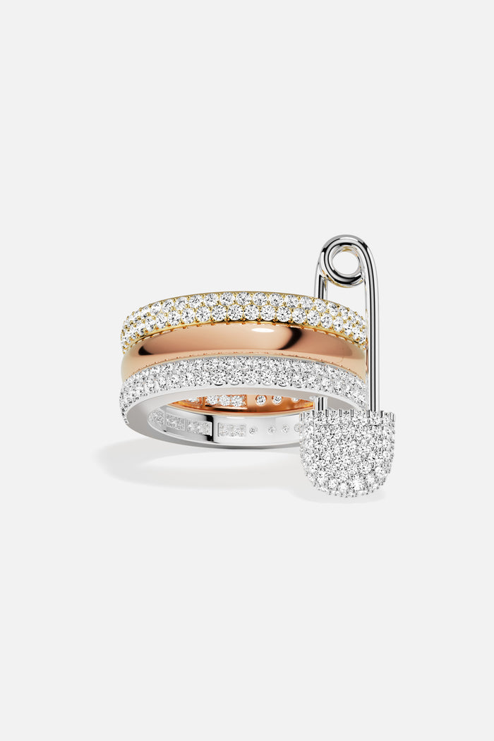 APM Ring, a playful pin charm meets shimmering two-tone allure.