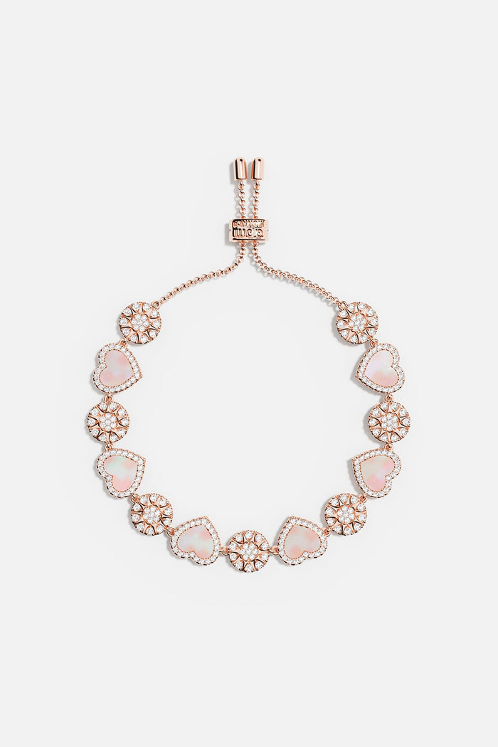 APM Bracelet in rose gold rhodium finish, hearts and blooms whispering pure romance.