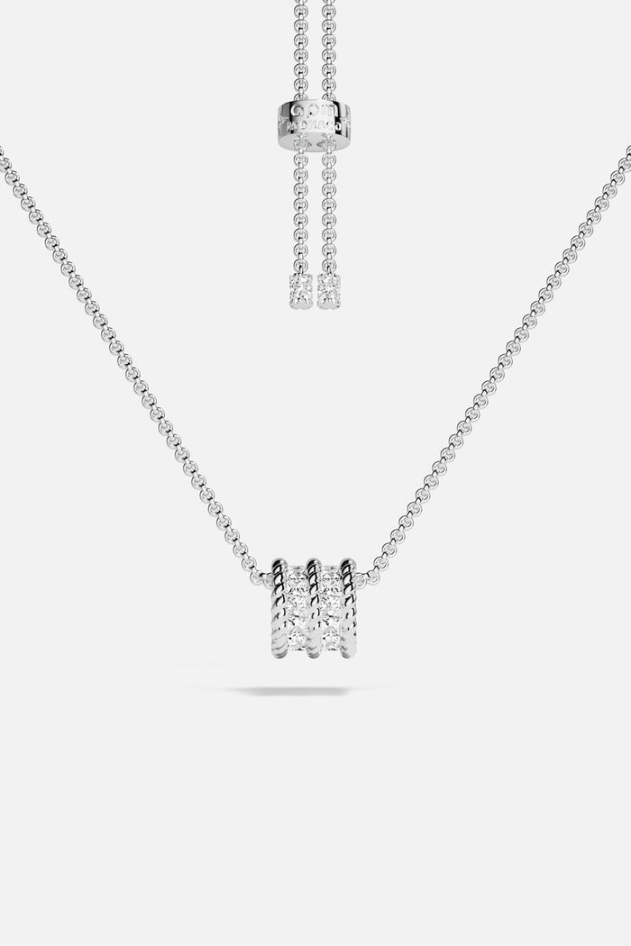 APM Necklace with a luminous charm, effortless elegance in rhodium finish.