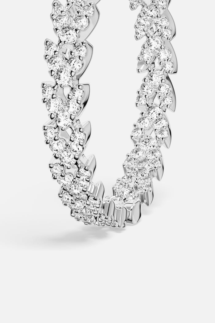 APM Hoop Earrings, a sparkling chain silhouette in rhodium finish, effortlessly radiant.