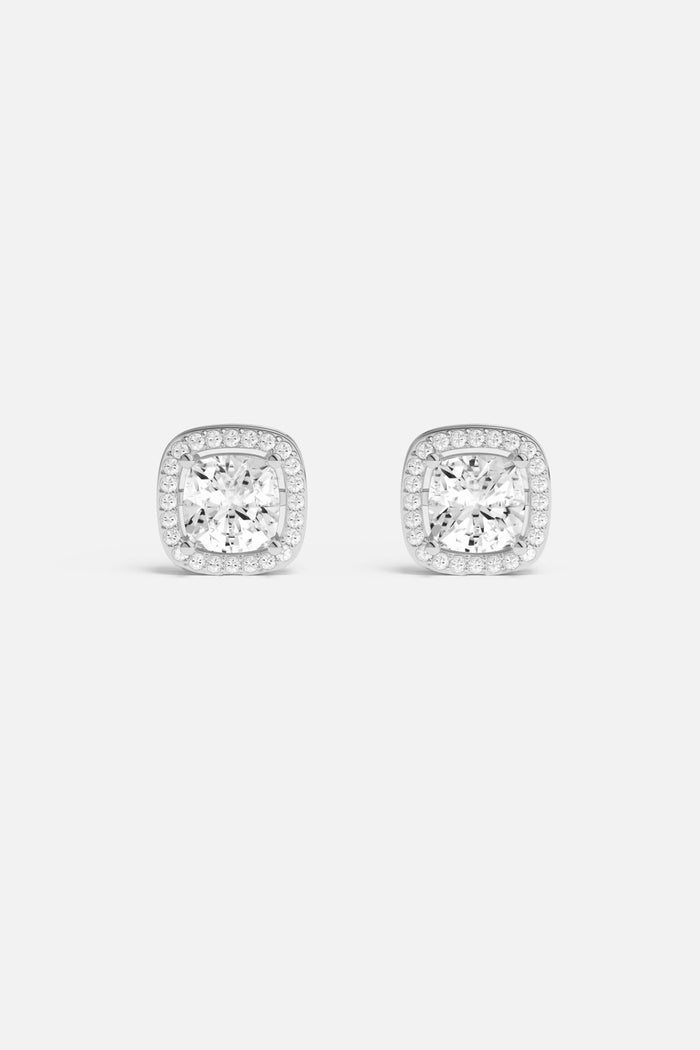 APM Stud Earrings, cushion-cut brilliance framed in rhodium finish, timeless everyday sparkle.
