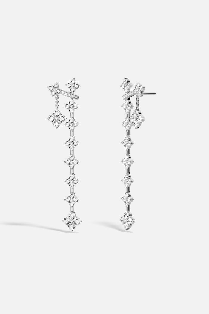 APM Monaco drop earrings, a cascade of shimmering clovers in rhodium finish.