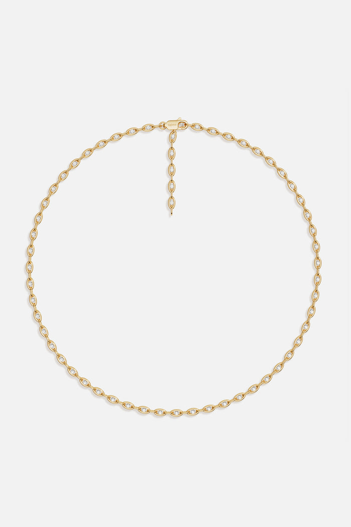 APM Necklace in golden color, luminous links flowing with effortless modern elegance.
