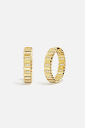 APM Hoop Earrings in golden hue, ridged brilliance for a bold, radiant statement.
