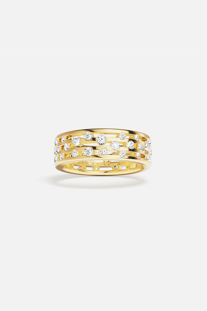 APM Ring in golden color, a scattered sparkle of quiet confidence.