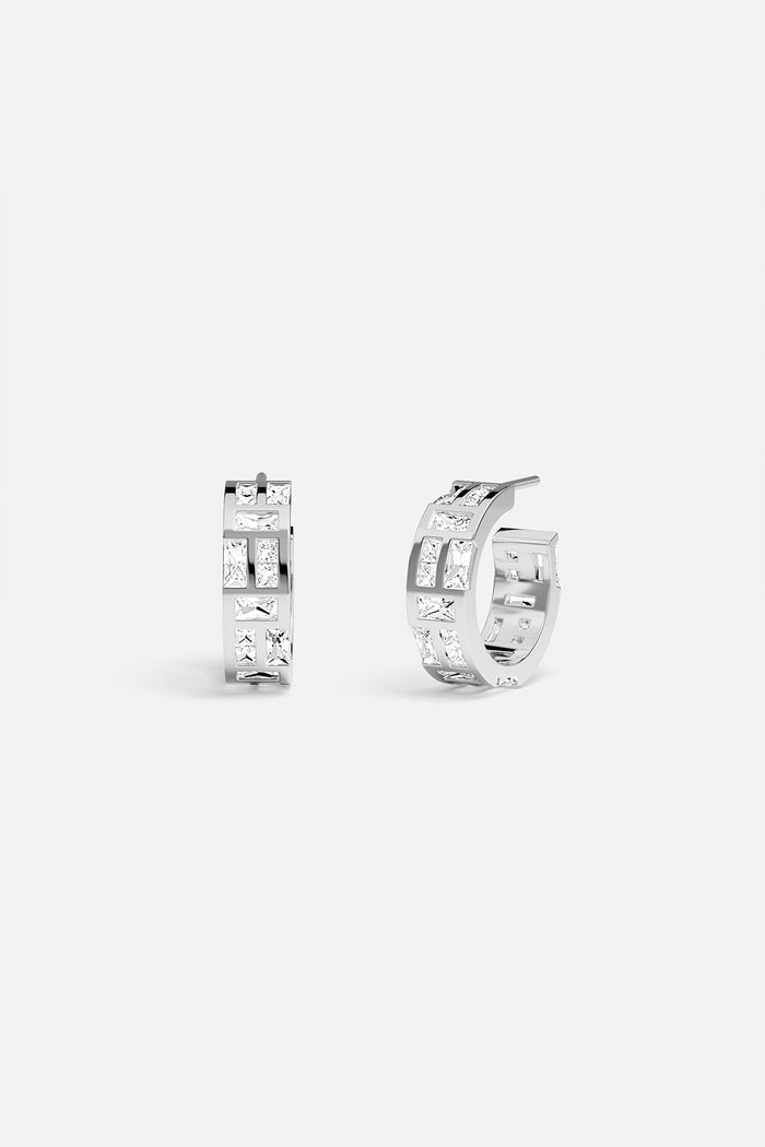 APM Hoop Earrings in rhodium finish, a modern mosaic of light and elegance.