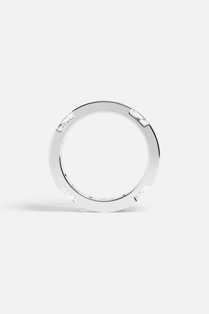 APM Ring in rhodium finish, sleek architectural lines with a quiet modern glow.