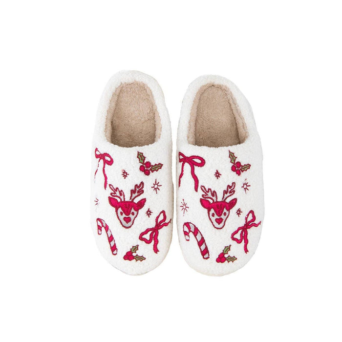 White Christmas slippers with red reindeer, bow, holly, and candy cane embroidery design