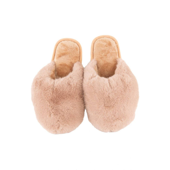 Tan faux fur jumbo slippers with suede soles on white background, top view