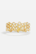 APM Ring in golden color, a constellation of sparkle wrapped in quiet luxury.
