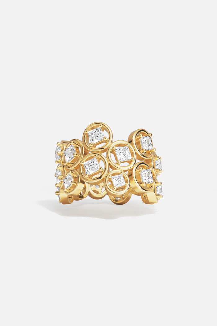 APM Ring in golden color, a radiant cluster of light and modern elegance.