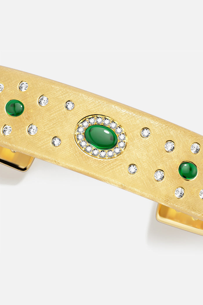 APM Hair Clip in golden hues, scattered crystals and green stones, quiet opulence.