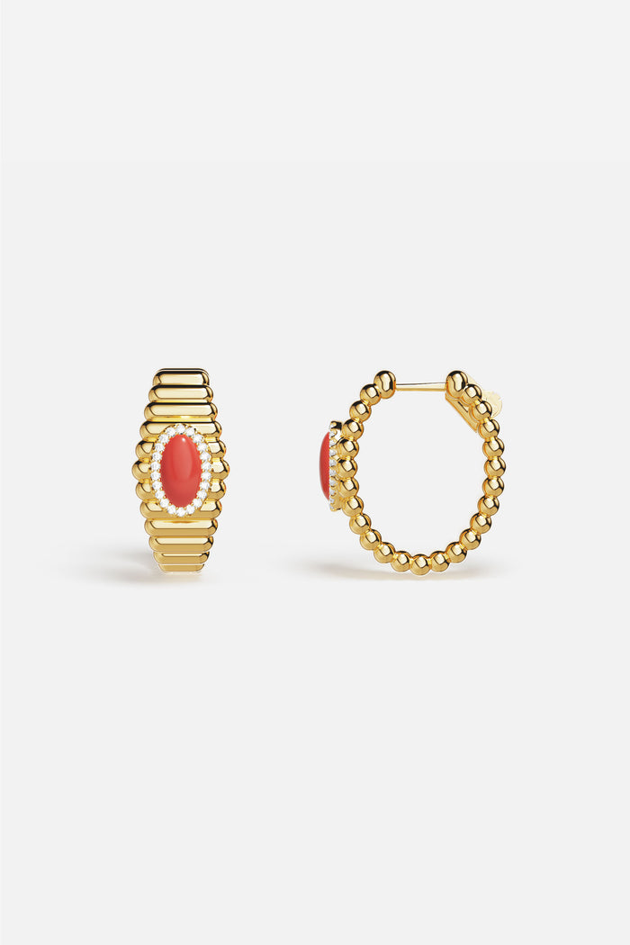 APM Hoop Earrings in golden warmth, glowing with a coral heart of quiet elegance.