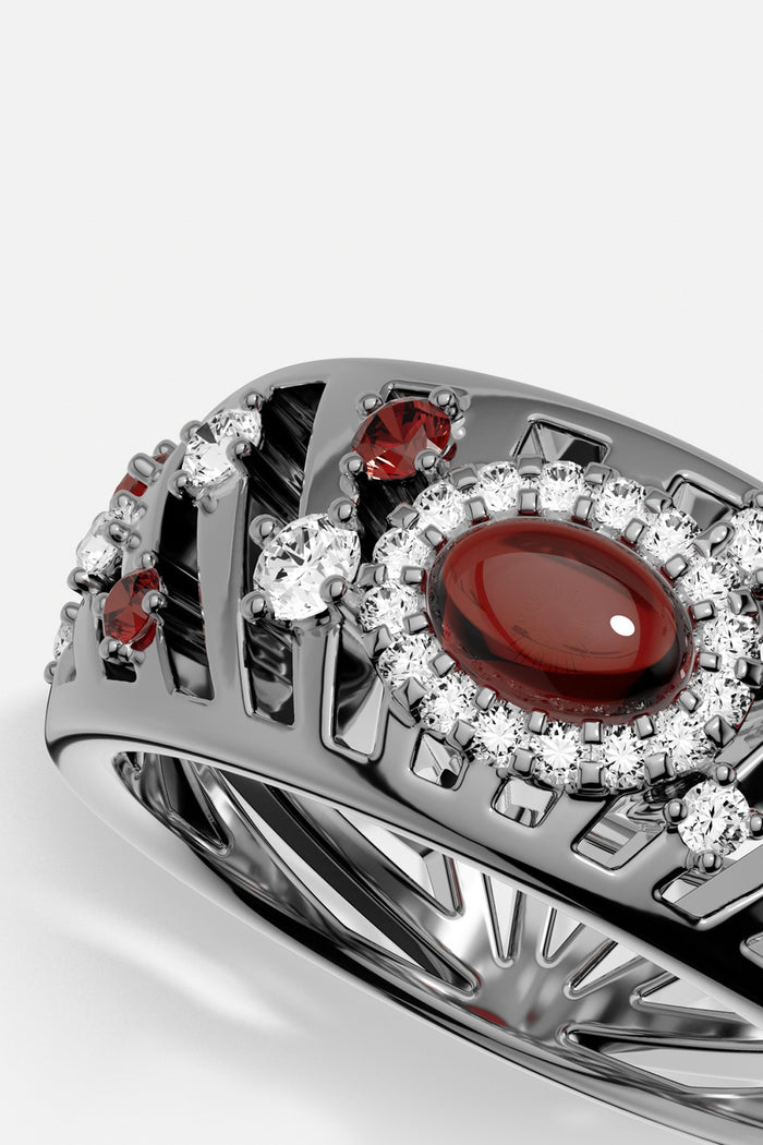 APM Ring in rhodium finish, deep red glow surrounded by a shimmering halo.