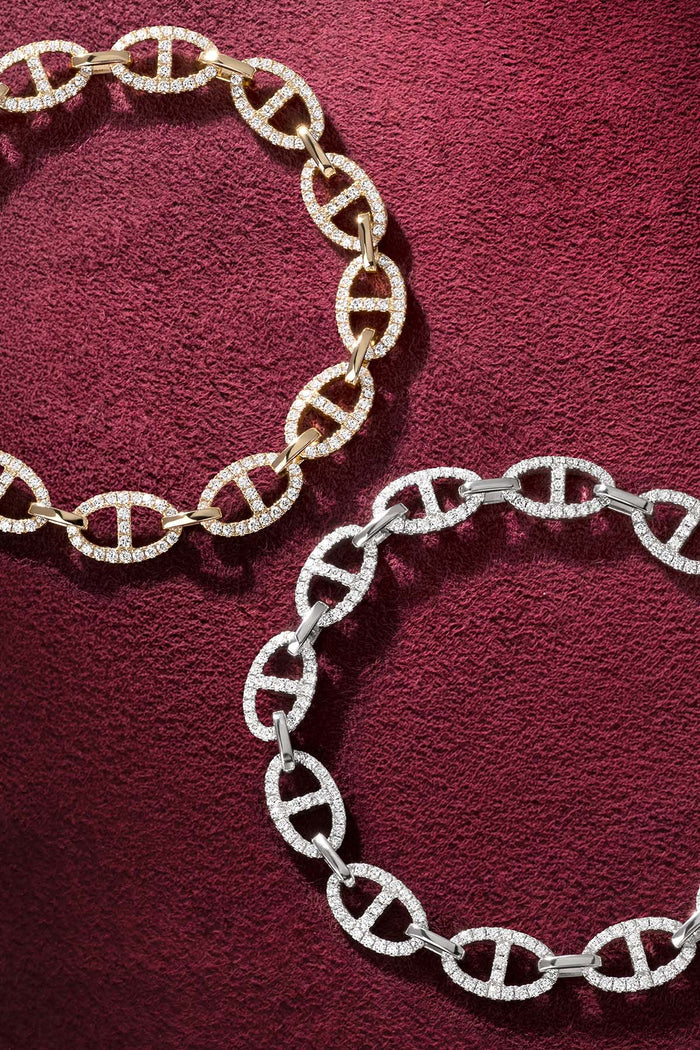 APM Bracelets in dazzling marine links, a bold duo shining with quiet confidence.
