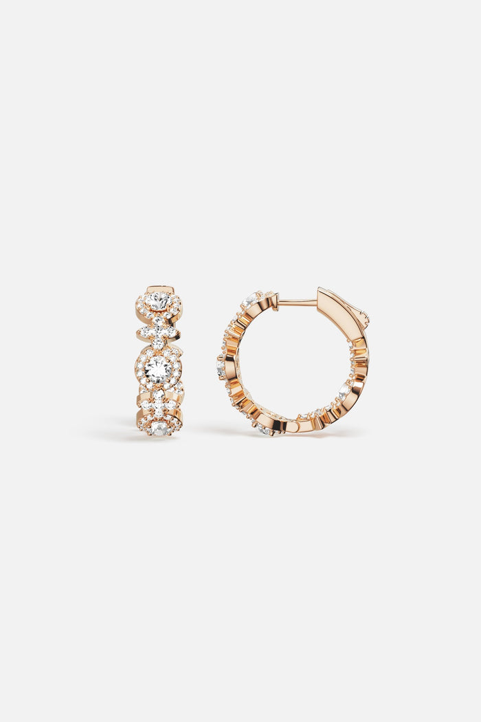 APM Hoop Earrings in rhodium finish, a radiant whisper of everyday elegance.