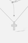 APM Cross Necklace, a shimmering symbol of quiet elegance and modern grace.