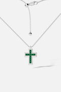 APM Cross Necklace, a luminous green statement with rhodium finish brilliance.