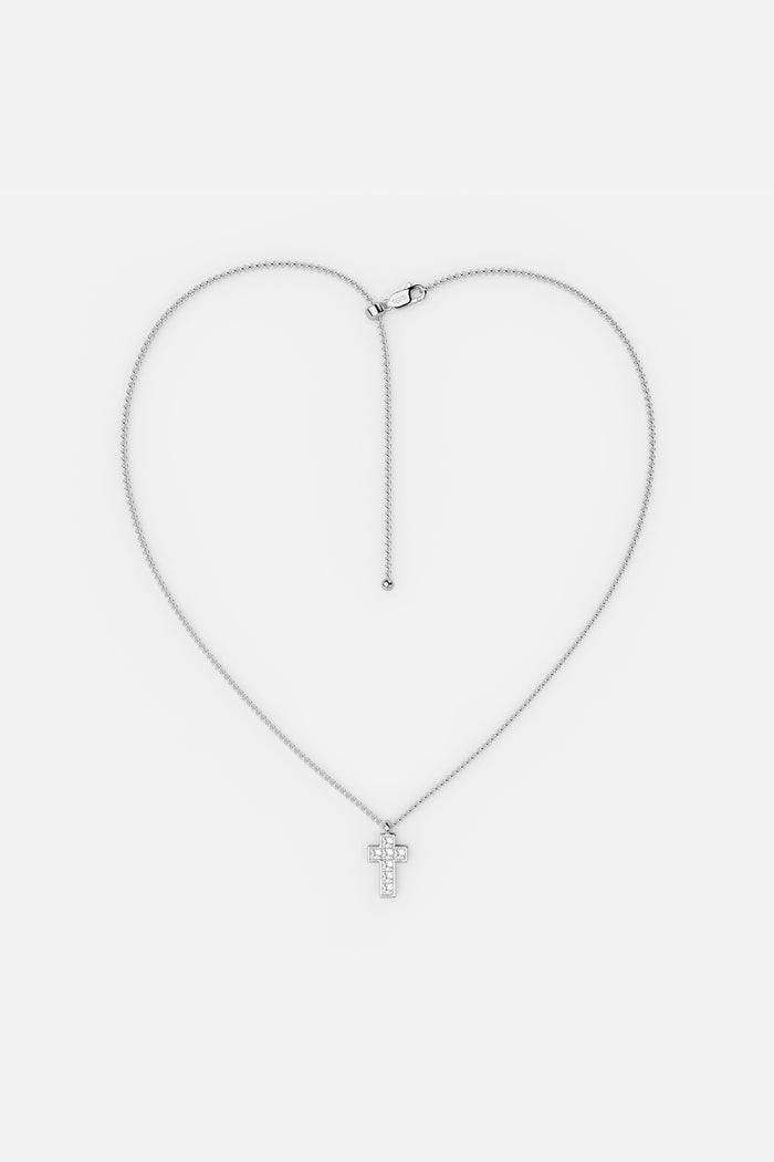 APM Cross Necklace in rhodium finish, a delicate emblem of quiet elegance.