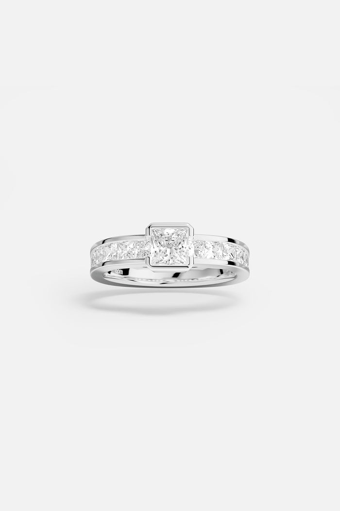 APM Ring in rhodium finish, a luminous square statement with quiet modern elegance.
