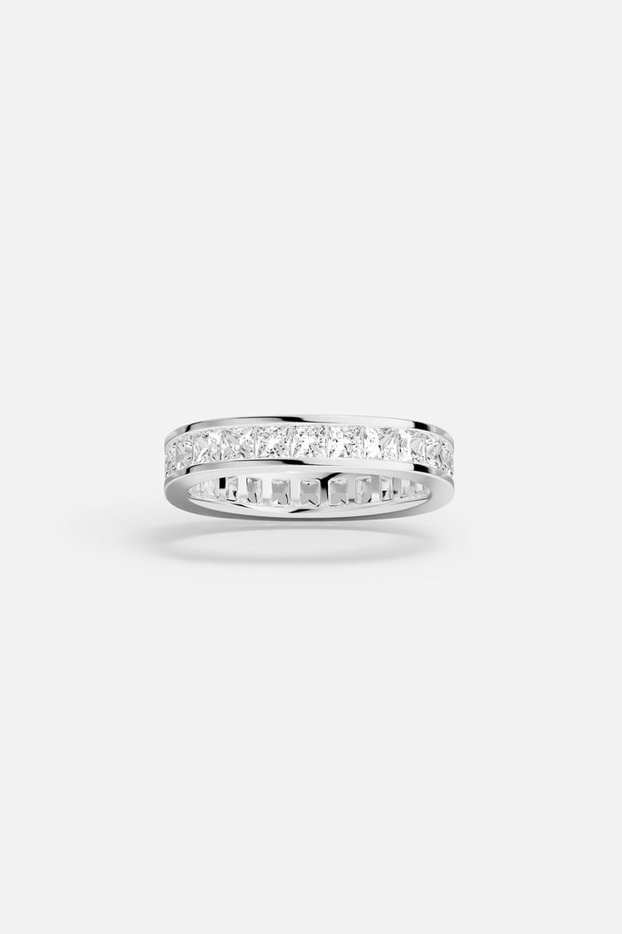 APM Eternity Ring, a luminous line of brilliance in rhodium finish.