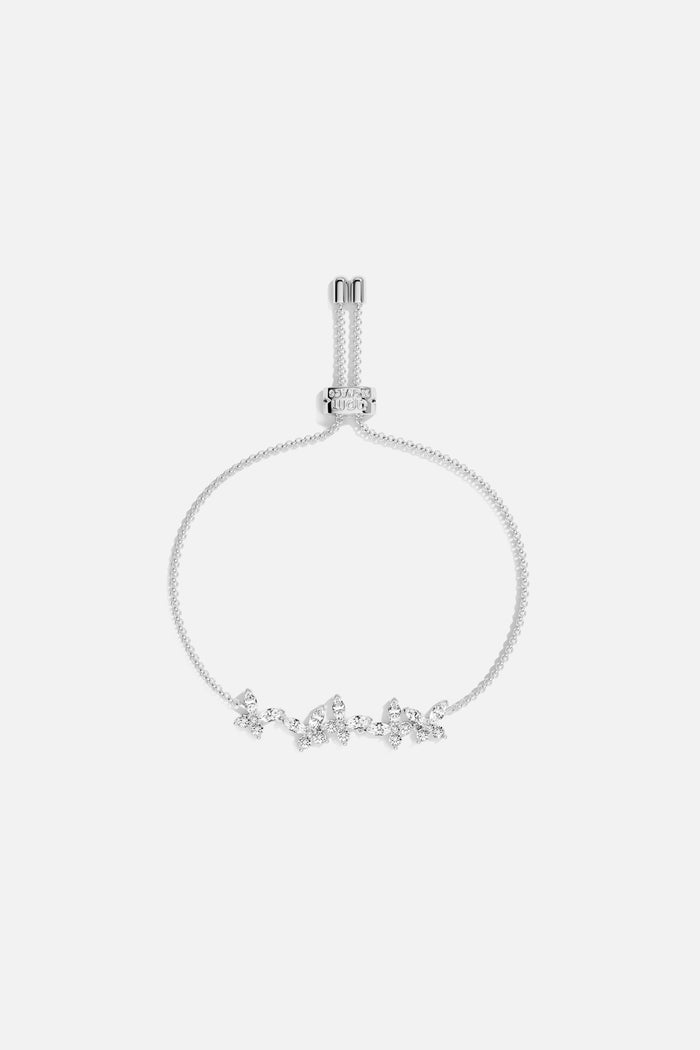 APM Bracelet in rhodium finish, a delicate floral sparkle for effortless charm.