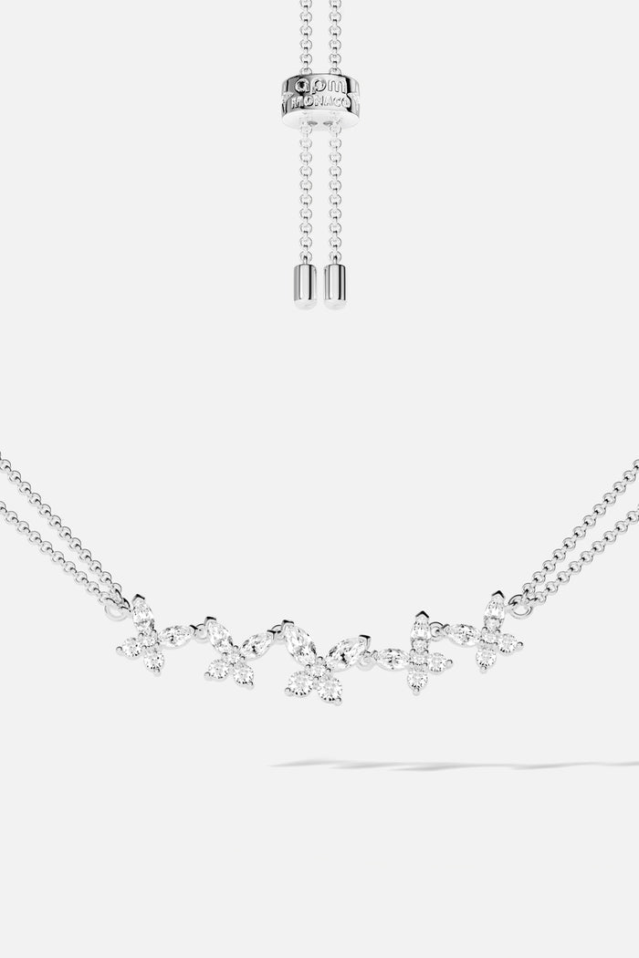 APM Monaco butterfly bracelet, a delicate rhodium finish flutter of shimmering elegance.