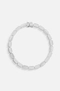 APM bracelet, sleek links and shimmering pavé in a modern rhythm.