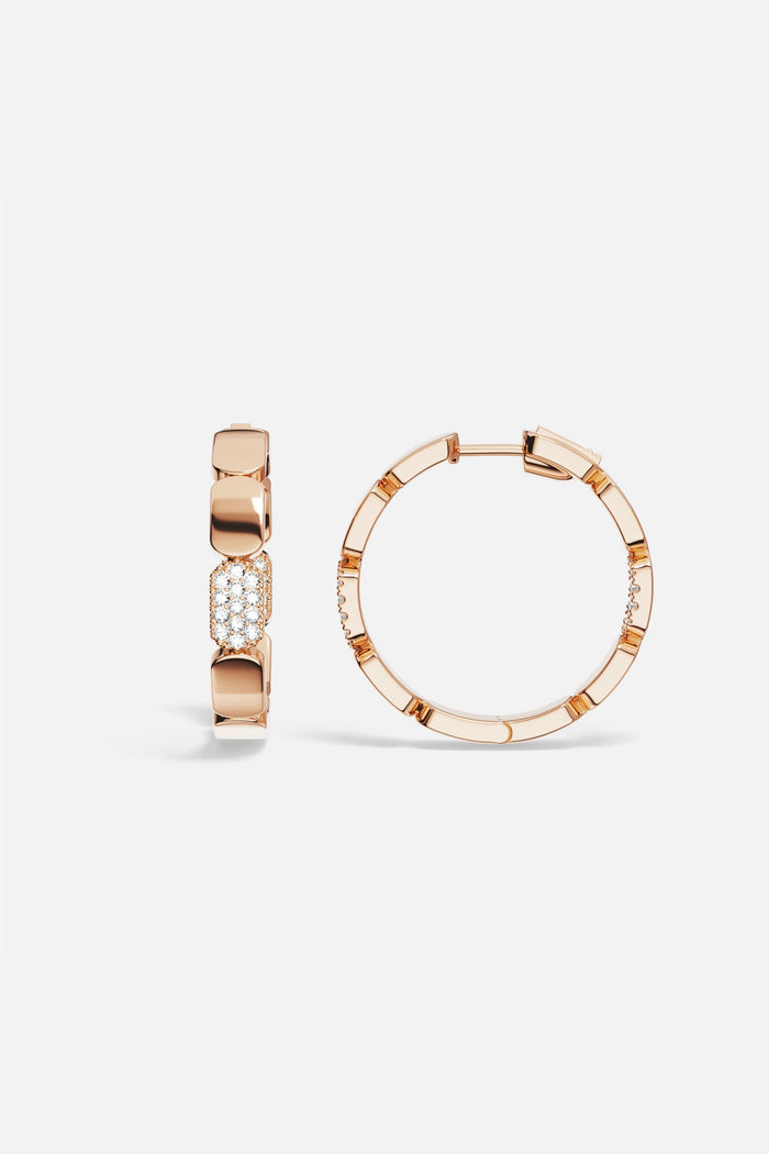 APM Hoop Earrings in a warm rose color, sculpted brilliance with an effortless glow.
