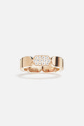APM Ring in rose color, bold links meet a shimmering pavé signature.