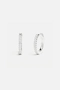 APM Hoop Earrings in rhodium finish, a delicate sparkle for effortless everyday elegance.
