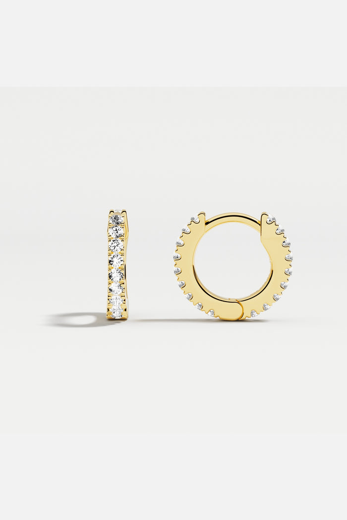 APM Hoop Earrings, a golden shimmer for effortless everyday elegance.