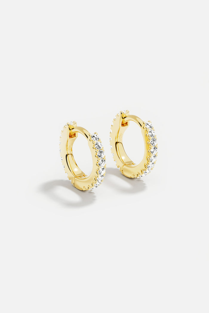 APM Hoop Earrings, golden radiance meets everyday elegance.