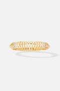 APM Monaco bracelet in golden color, a bold rhythm of modern elegance.