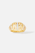 APM Ring, a golden dome sculpted with radiant lines and quiet sparkle.