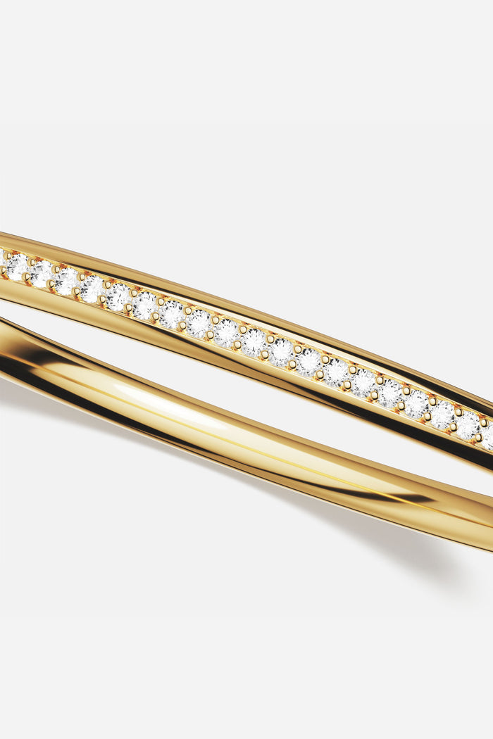 APM Bangle Duo, golden lines meeting quiet sparkle for effortless everyday luxury.