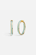 APM Hoop Earrings in golden hue with soft blue enamel, effortlessly radiant.