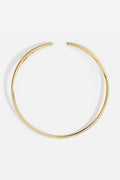 APM Choker Necklace in golden color, a sleek whisper of modern elegance.