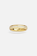 APM Ring in golden color, a luminous band of quiet elegance.