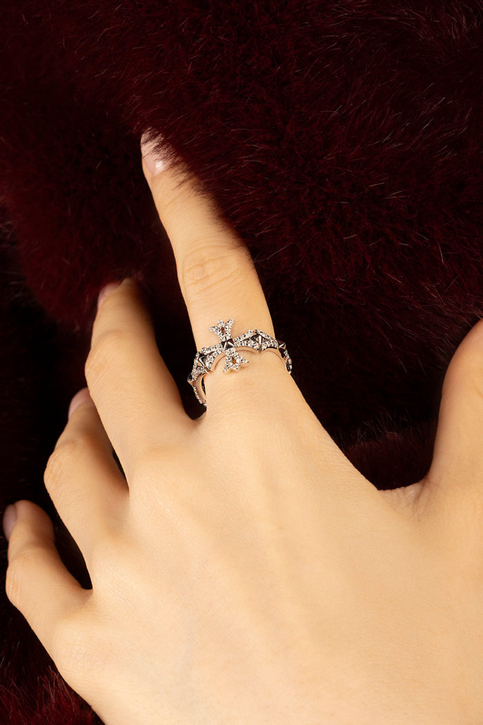 Woman wearing APM Morse Ring, a delicate sparkle whispering quiet elegance.