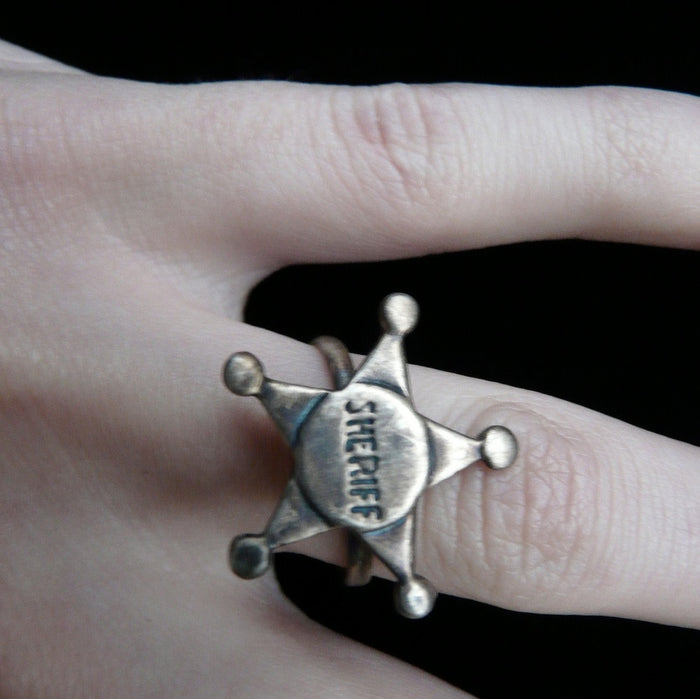 Andy Griffith and Don Knotts as Andy Taylor and Barney Fife with Fablesintheair's Sterling Silver Adjustable Sheriff's Star Ring. For the cowboy or cowgirl in us all. Sterling Silver Sheriff's Star Adkistable Ring. Sheriffs usually keep their stars bright and shining and this whimsical gumball ring is no exception, with a little smudge of oxidization to showcase the detail.