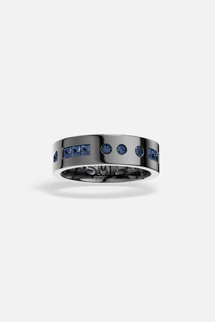 APM Ring in dark rhodium finish with deep blue stones, boldly modern.